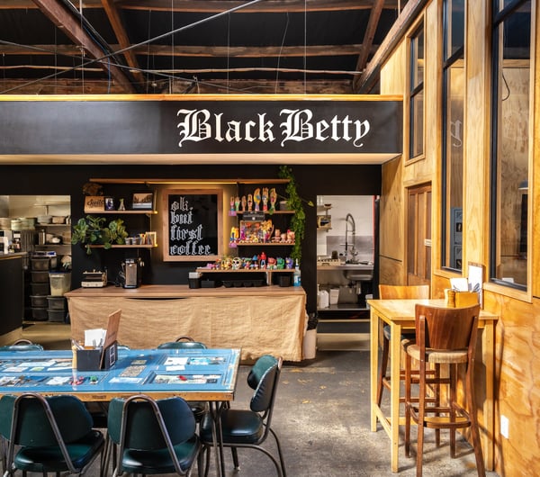 Front counter with table in the foreground at Black Betty.