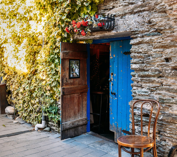 A blue door leading to a bar in Arrowtown.