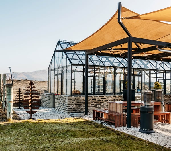 A large glasshouse outside Carrick Winery Bannockburn Central Otago.