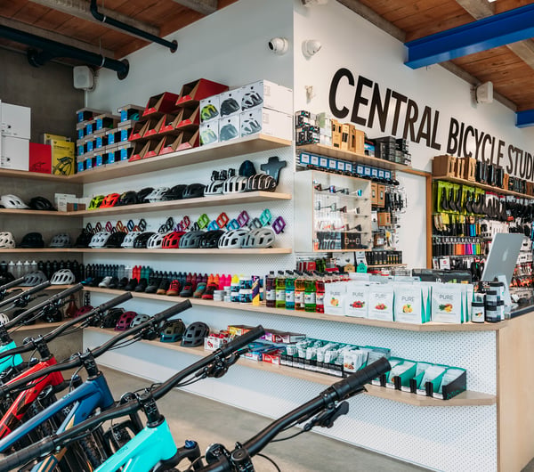 Front counter at Central Bicycle Studio and bikes surrounding it.