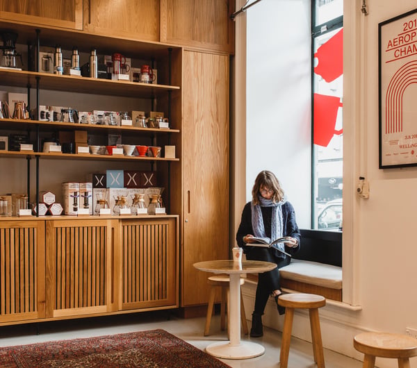 Customer reads a journal at Coffee Supreme Midland Park, Wellington.