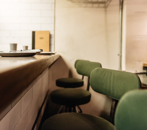 Green bar stools.