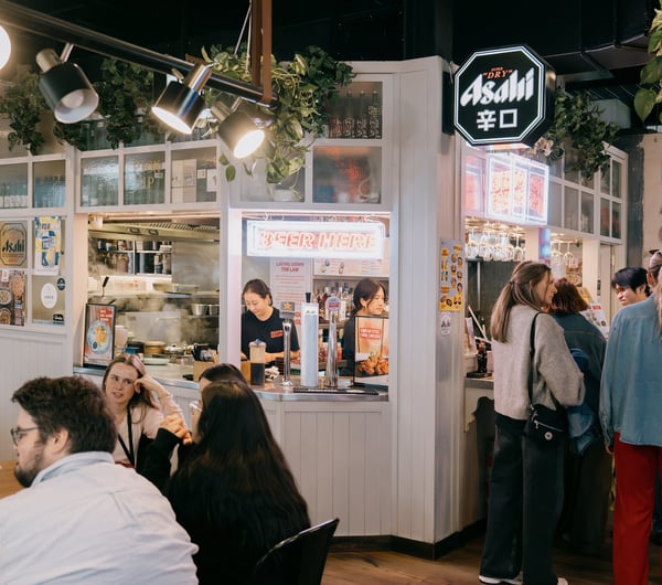 People queueing outside Eightgrains eatery inside Little High Eatery in Christchurch
