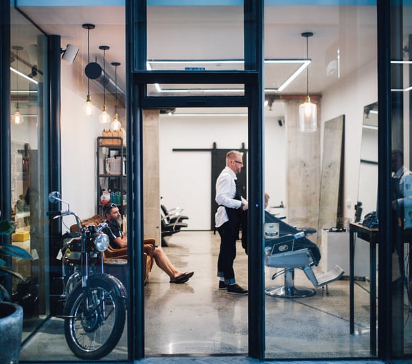 Entrance to Fox Kennedy barber in Hamilton.