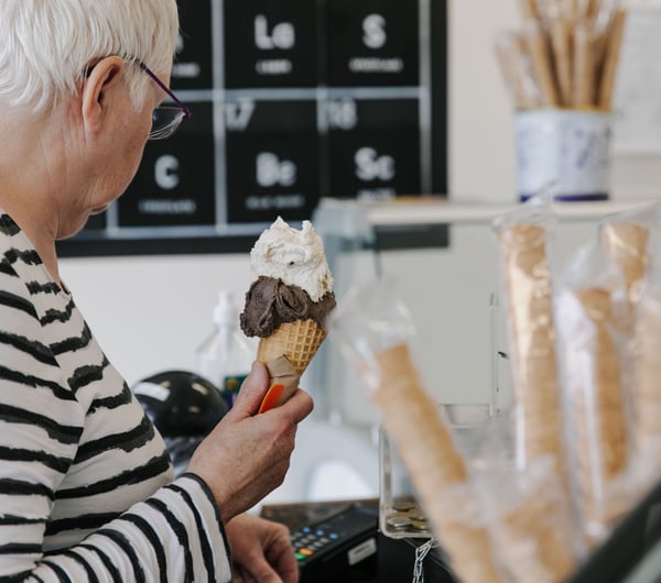 Customer holding her Gelato Lab ice cream.