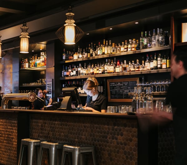 Staff working behind the bar at Harry's Hawker House.