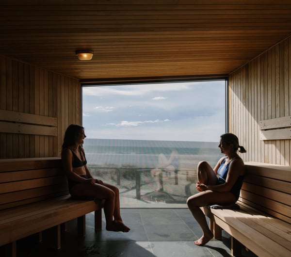 Two friends in the sauna at He Puna Taimoana.