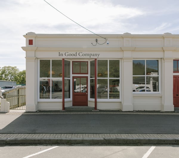 The cream brick building of In Good Company Kurow.