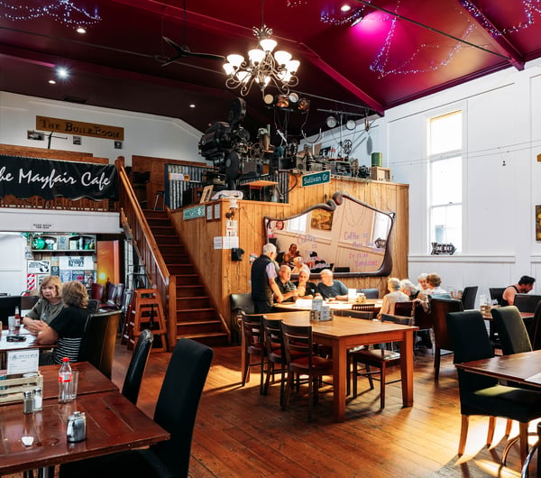 Busy cafe dining space at Mayfair Cafe.