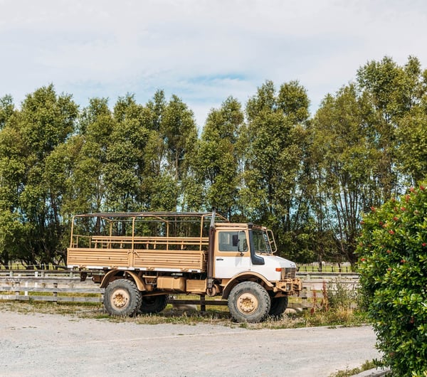 Army style pickup truck outside at MnM Collection in Upper Hutt