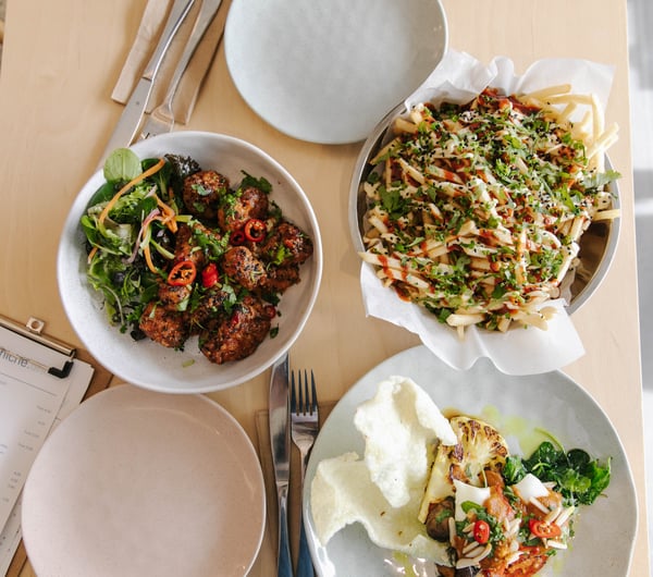Table of delicious food at Niche Cafe and Eatery in Sumner.