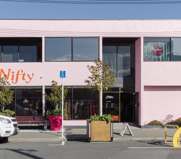 Bright pink building exterior of Nifty.