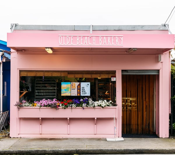Exterior view of the pink Olde Beach Bakery.