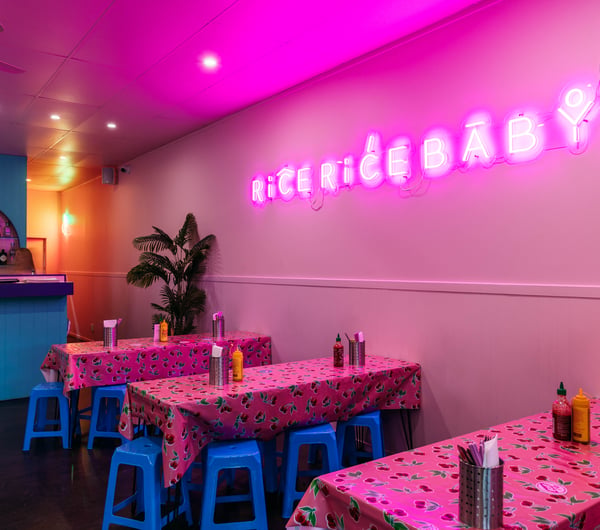 The bright pink and blue interior of Rice Rice Baby in Hamilton.