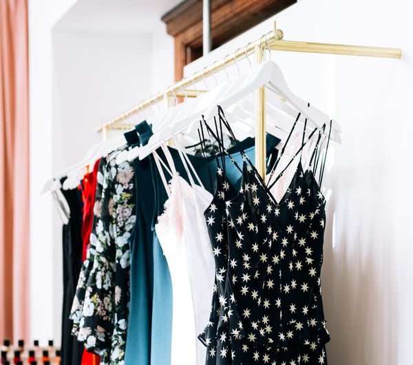 Dresses on hangers at RUBY, Wellington.