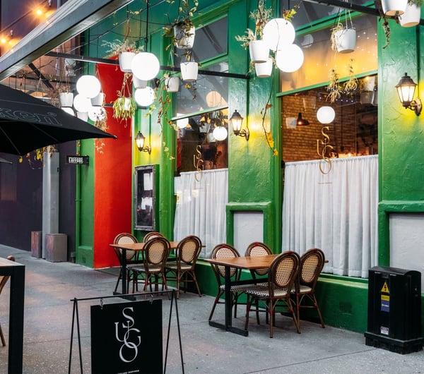 The green exterior of an Italian-style restaurant in Tauranga.
