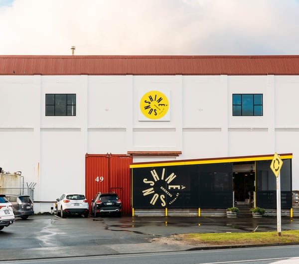 The white exterior of The Sunshine Brewery Gisborne.
