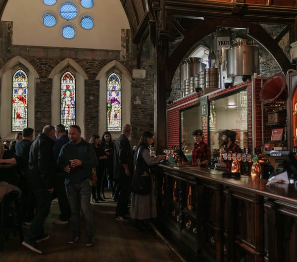 The busy bar inside The Church Pub.