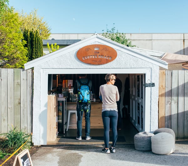 A woman waiting in line at The Coffee Shack.
