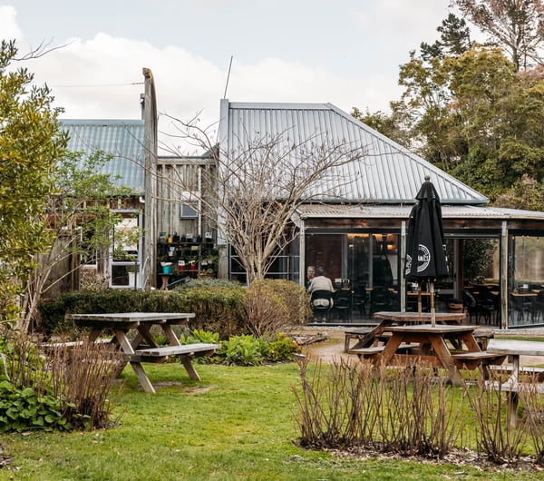 Tables outside the main building of The Herb Farm.