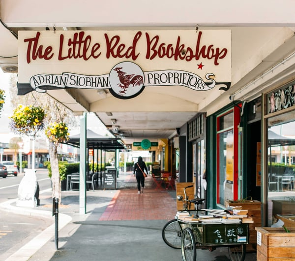 The exterior signage of The Little Red Bookshop in Hastings.