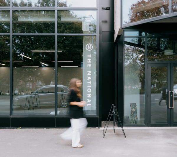 Person walking past exterior of The National gallery in Christchurch