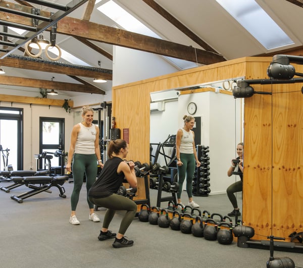 Personal trainer and client during a training session at The Well - Whole Body Studios.