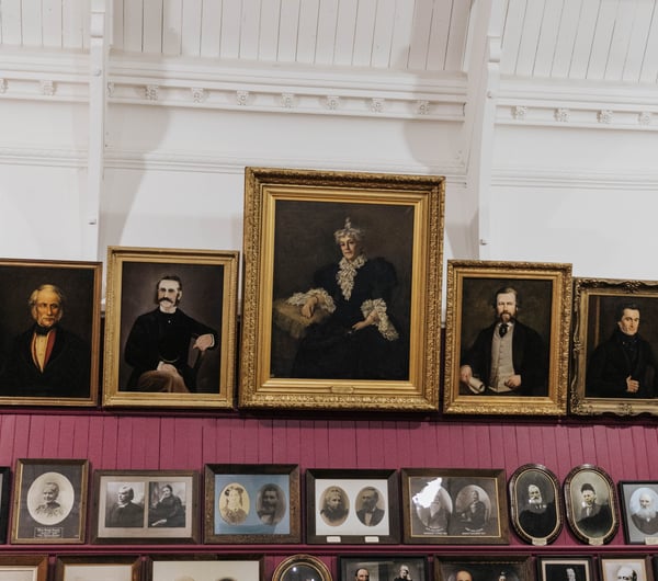 Portraits on a wall.