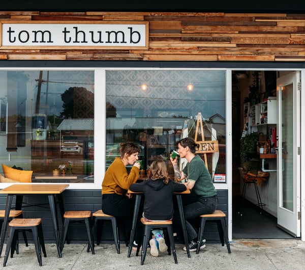 Exterior cafe view of Tom Thumb.