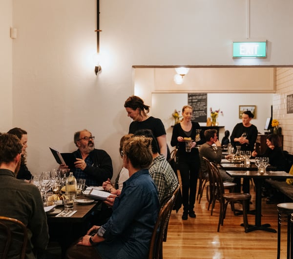 Customers dining inside the restaurant.