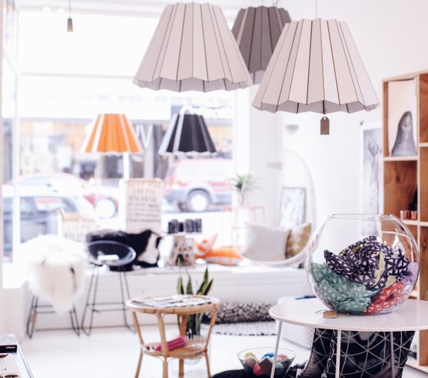Interior of shop with hanging lights.