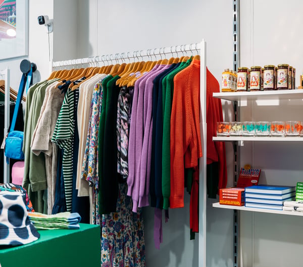 Colourful clothes and candles displayed inside Wanda Harland in Petone.