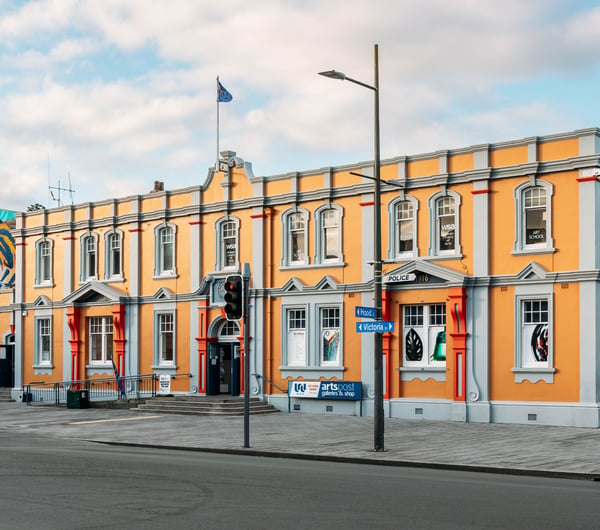 Exterior of Arts Post Building in Hamilton with street in front of it.