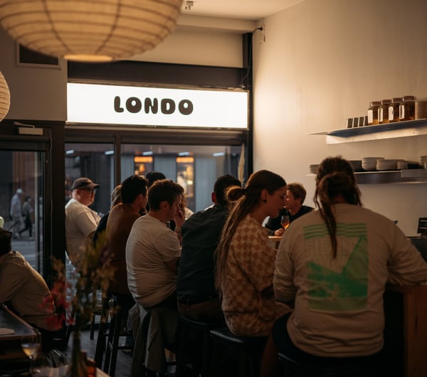 People dining at the bar at Londo.