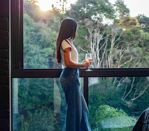 Guest looking at the view from the balcony.