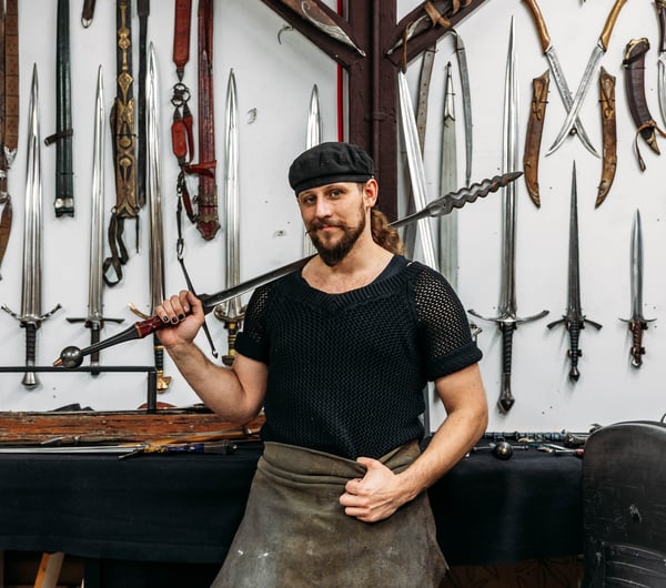 A man holding a sword.
