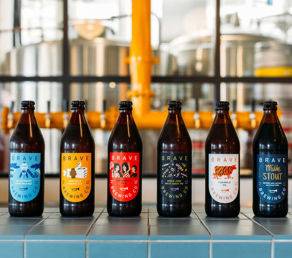 Bottles of beers lined up on a counter at Brave Brewing in Hastings.