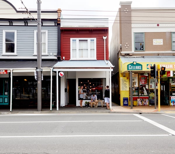 A view of shops from the other side of the street in Wellington's Newtown suburb.