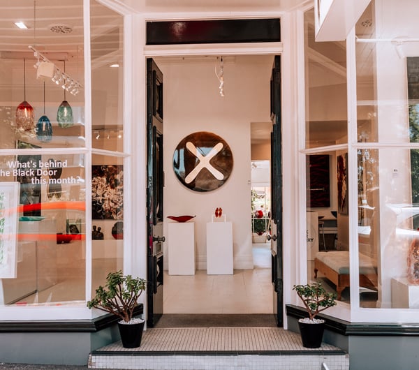 Looking through the open door of the Black Door Gallery in Parnell.