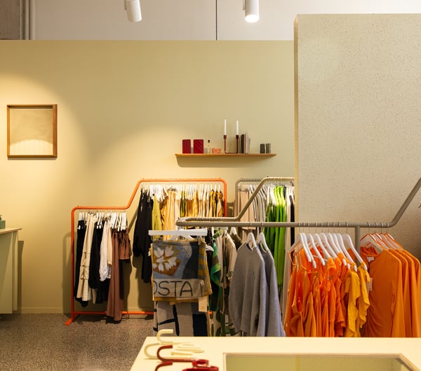 Colourful items and a rack of clothing from FOUND store in Hamilton.