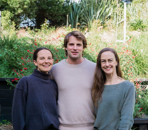 The Tussock Hill management team smiling to camera outside.