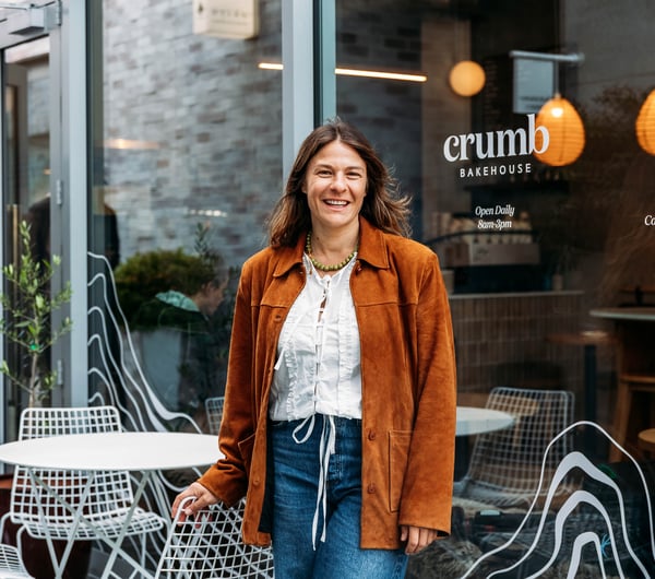 Lucy standing outside Crumb bakery.