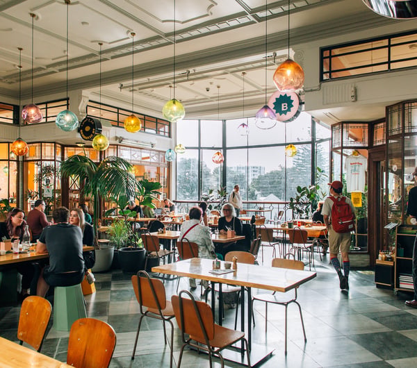 People dining inside St Kevins Arcade in Auckland.
