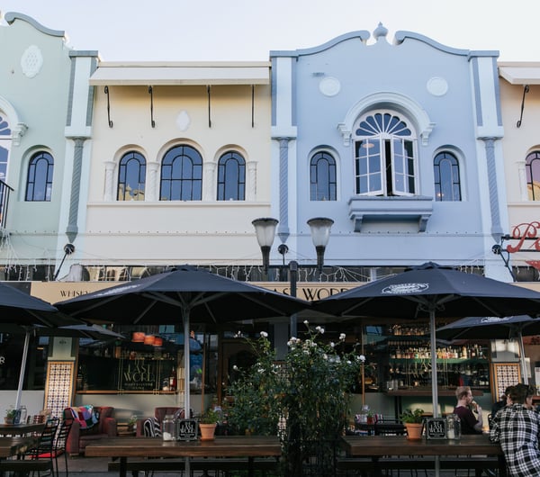 Blue, yellow and green building fronts in Christchurch's new regent street.