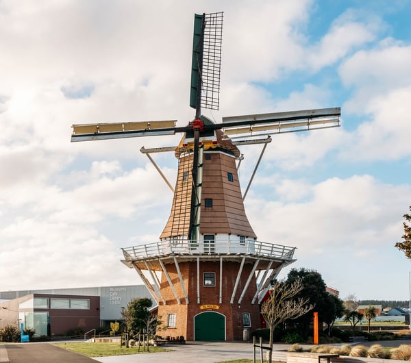 A large windmill building.