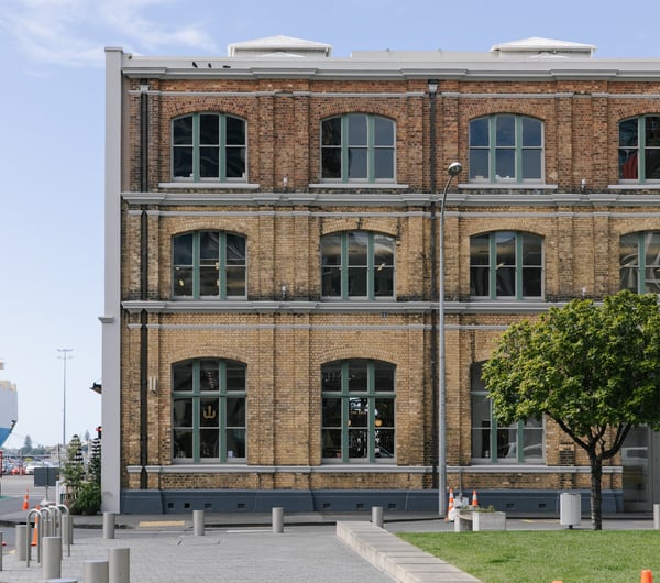 A large brick building on a sunny day at Britomart in Auckland.