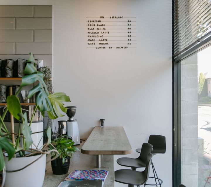 The bench seating next to the counter inside Lux Espresso Christchurch.