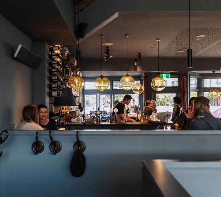 Customers dining inside No.7 Balmac.