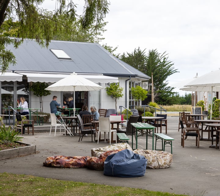 Outdoor seating area outside the cafe at the Old School Collective in North Canterbury.