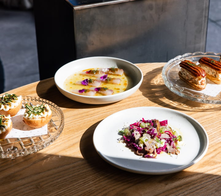 Light hitting a selection of plates on table at Onslow in Auckland